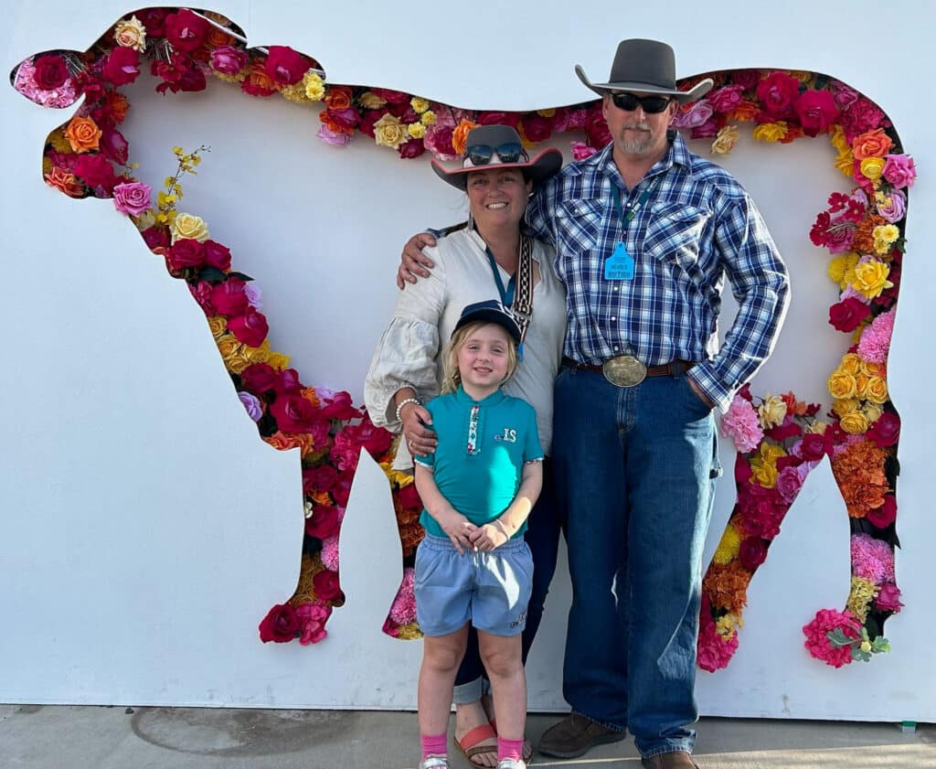 A family photo of Jo, husband and daughter Millie who were helped during a medical emergency by Royal Flying Doctor Service (Queensland  Section) and a RFDS Medical Chest